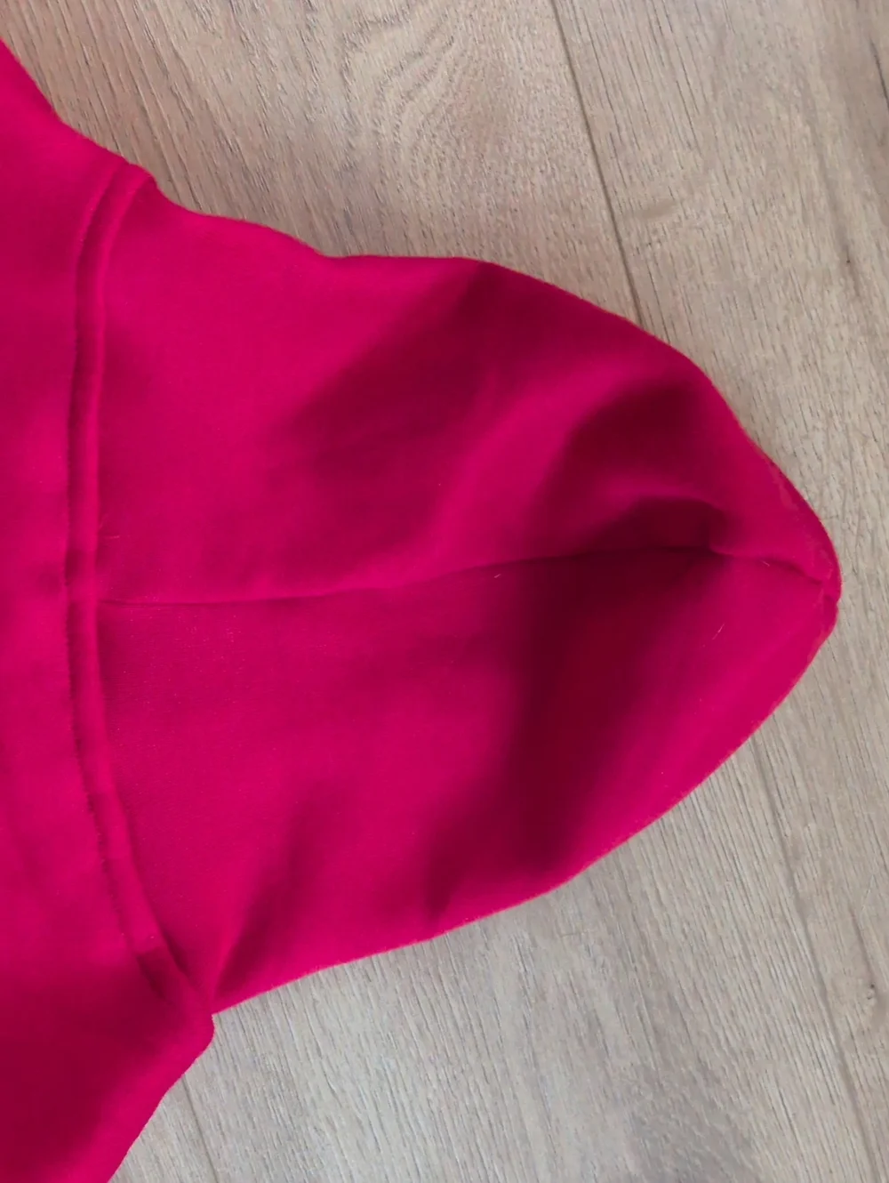 Vibrant Red Dog Hoodie with Playful Buc-ee's Mascot Graphic Size L